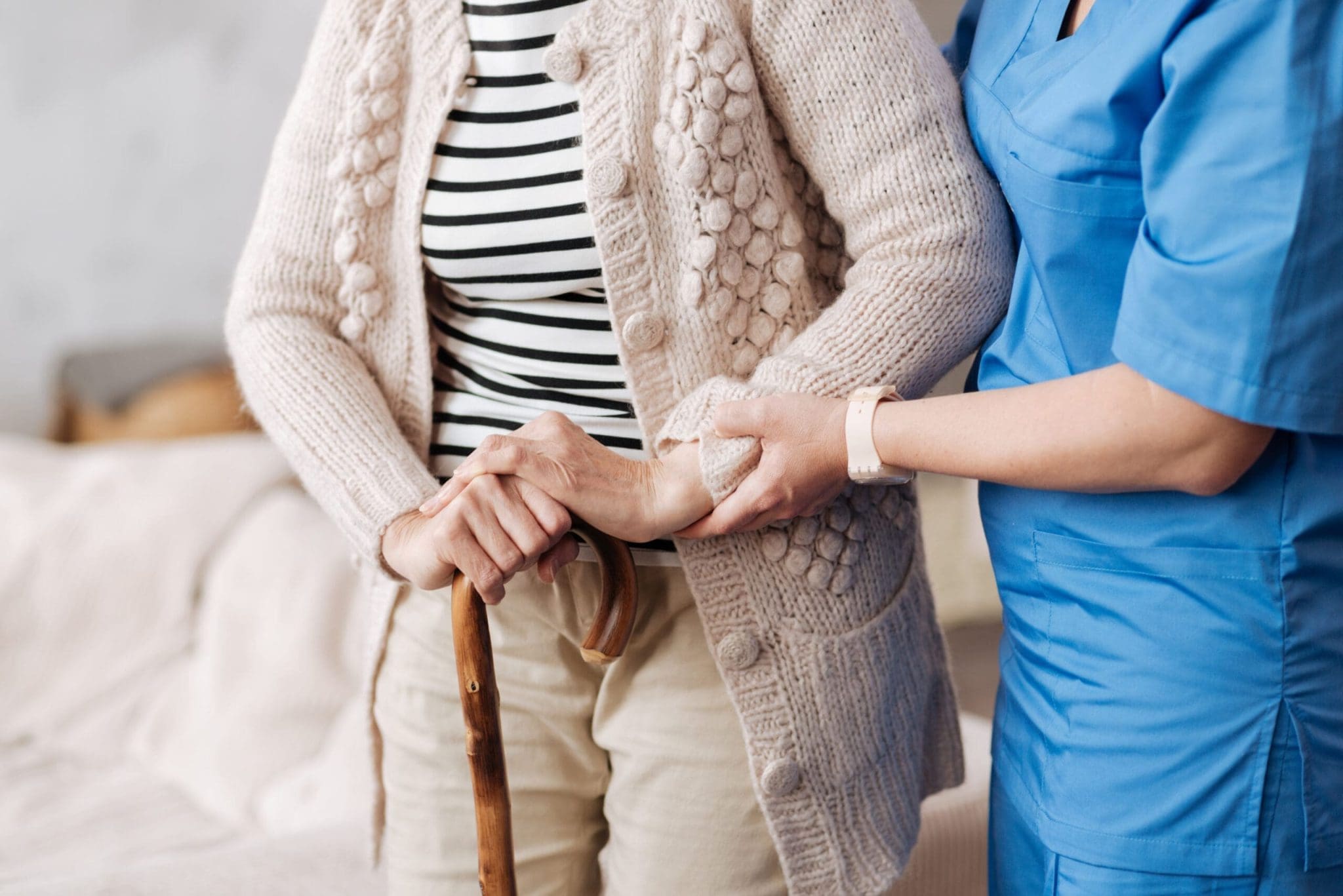 Supporting elderly hands, care home